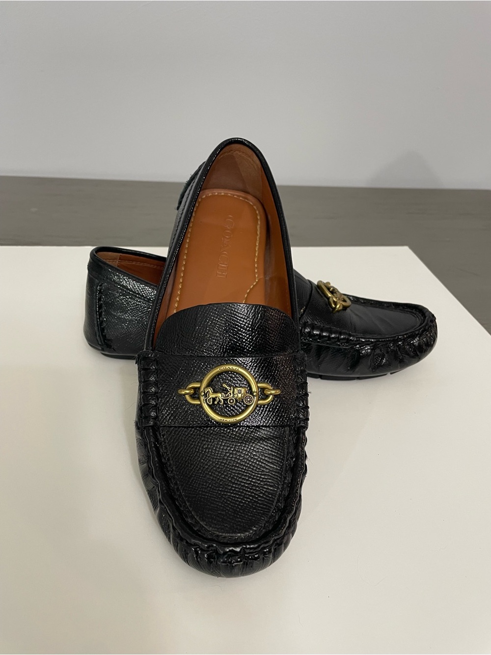Coach woman’s Black Pebbled Leather Loafers with Gold-Tone Bit